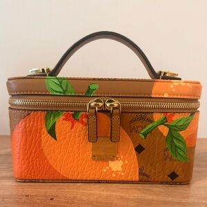 MCM Orange Upcycling Project Rockstar Vanity Case in Visetos
